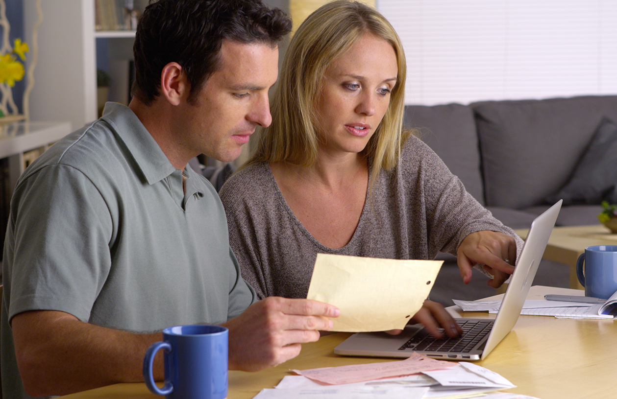 Man and woman considering a roth ira